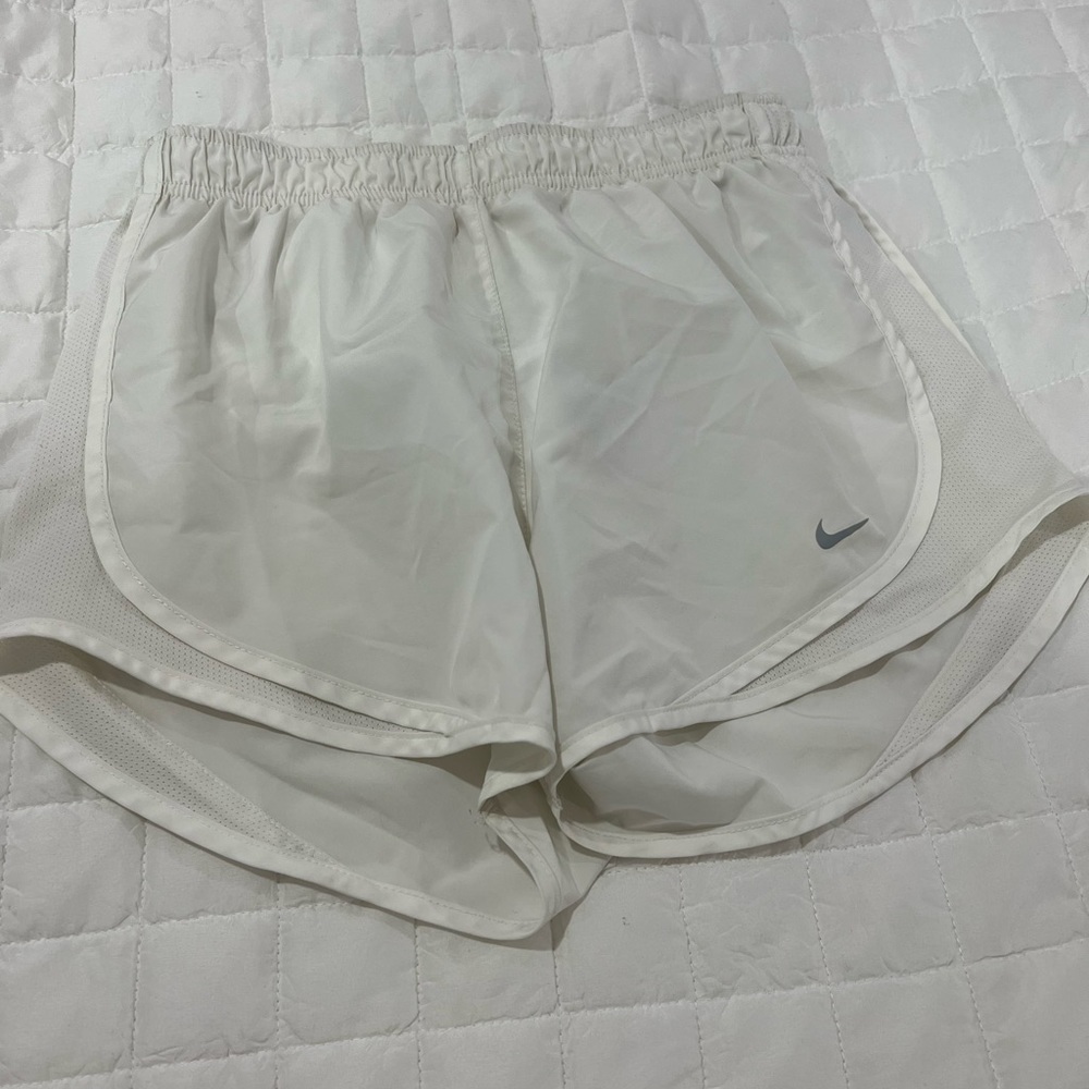 White Nike shorts